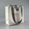 Customization - Bowknot - Gift Bag - Thread Ribbon1 luxury matte white paper gift bag with silver foil logo and gray ribbon bow closure