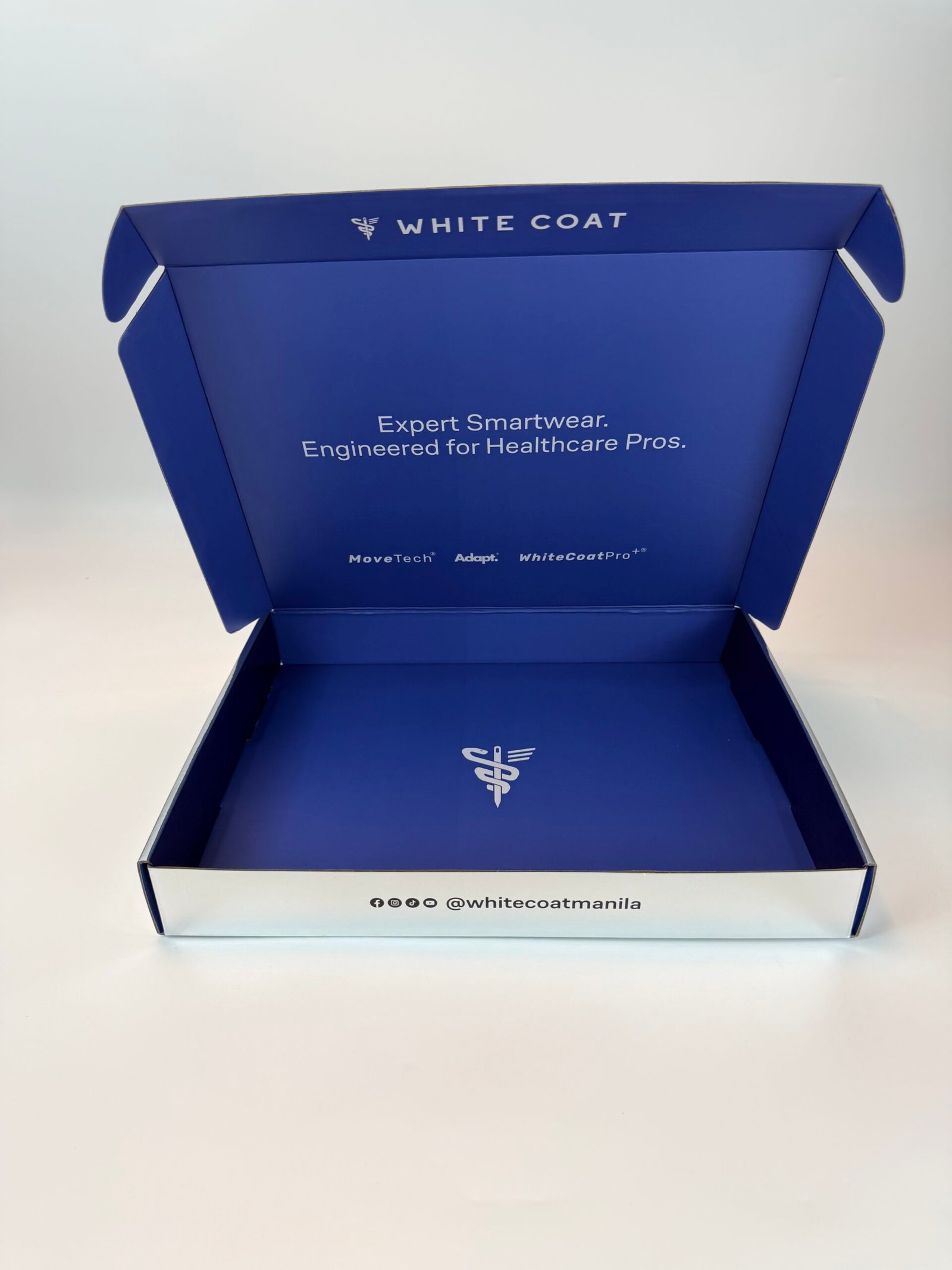 Premium double sided printed shipping box with silver exterior and matte blue interior