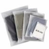 Various sizes custom non woven zipper bags packed with fashion clothing garments